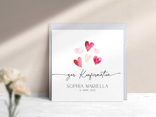 Moderne Karte zur Konfirmation mit rosa und roten Aquarell Herzen